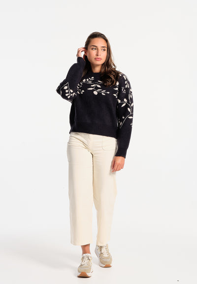 Women's navy blue sweater with flowers