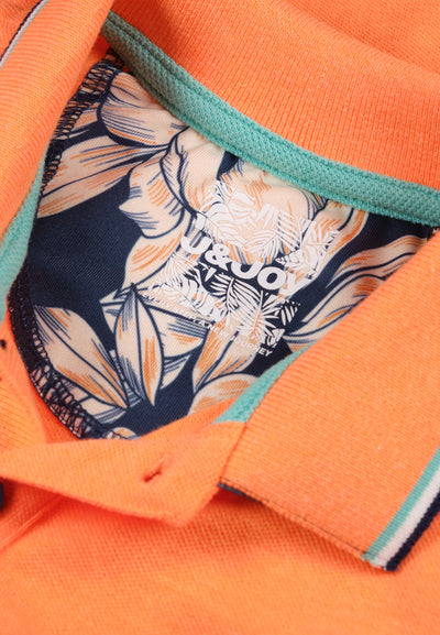 Boys' orange polo shirt with contrasting finishes