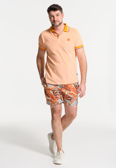 Men's orange polo shirt with abstract patterns