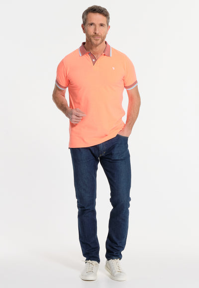Men's coral polo shirt with patterned finishes