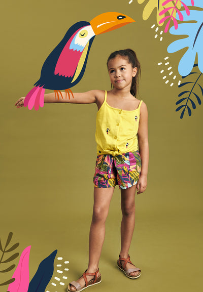 Girl's top with thin buttonhole straps, toucans print and bow